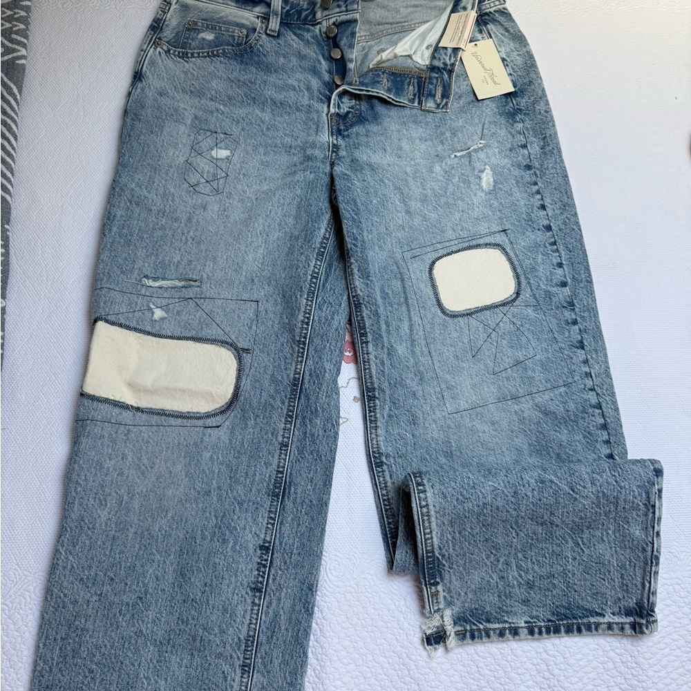 Light Wash Distressed Women’s Jeans with Patch Details